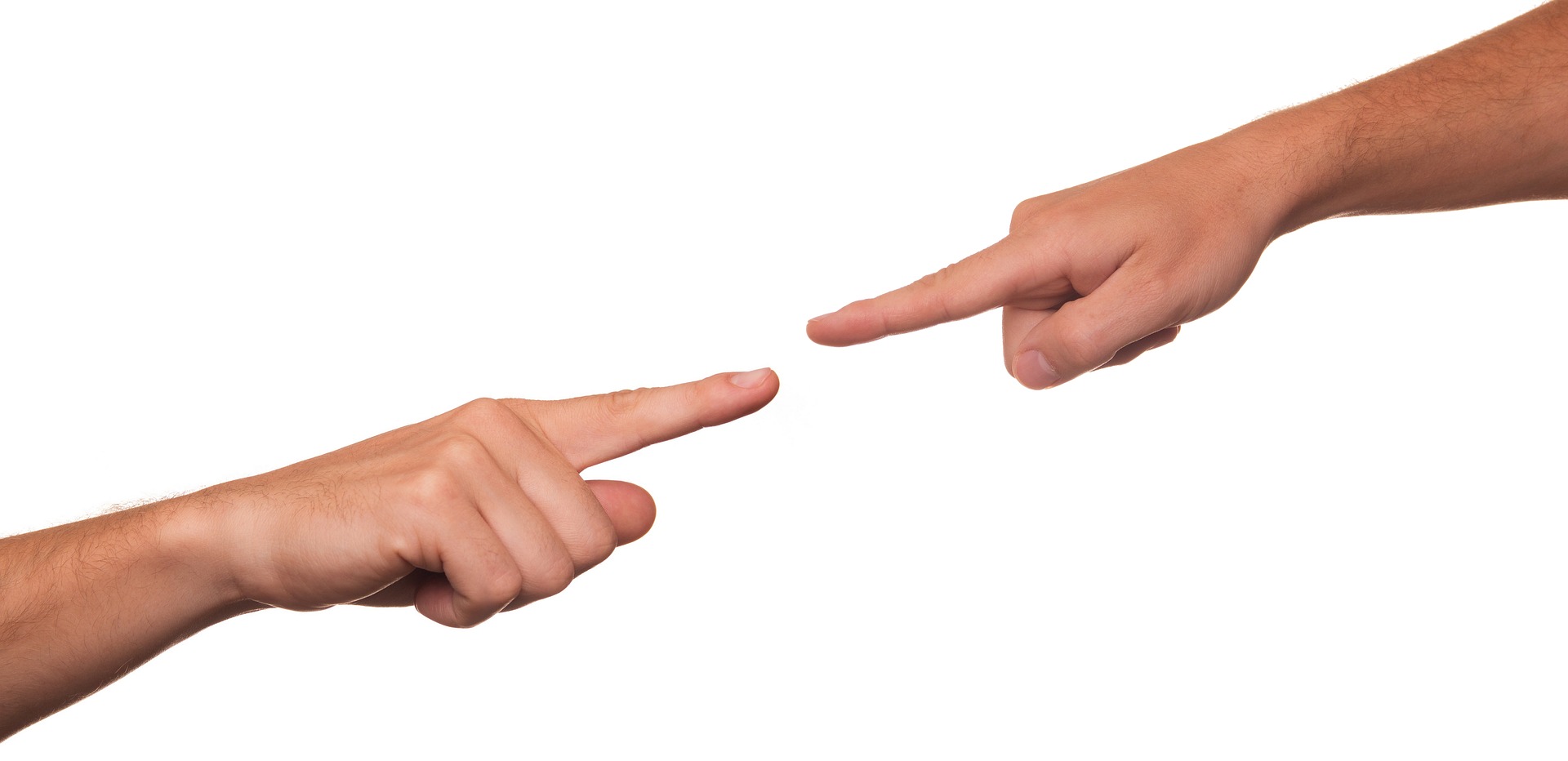 Two hands with outstretched index fingers are pointing towards each other against a white background. The scene resembles Michelangelo's 