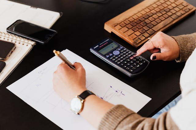 accountant working with calculator